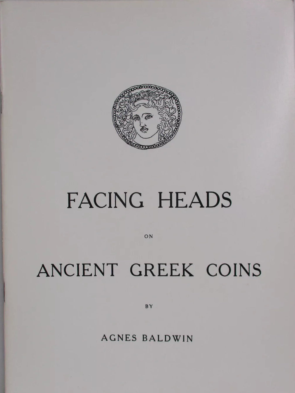 Facing heads on ancient Greek coins